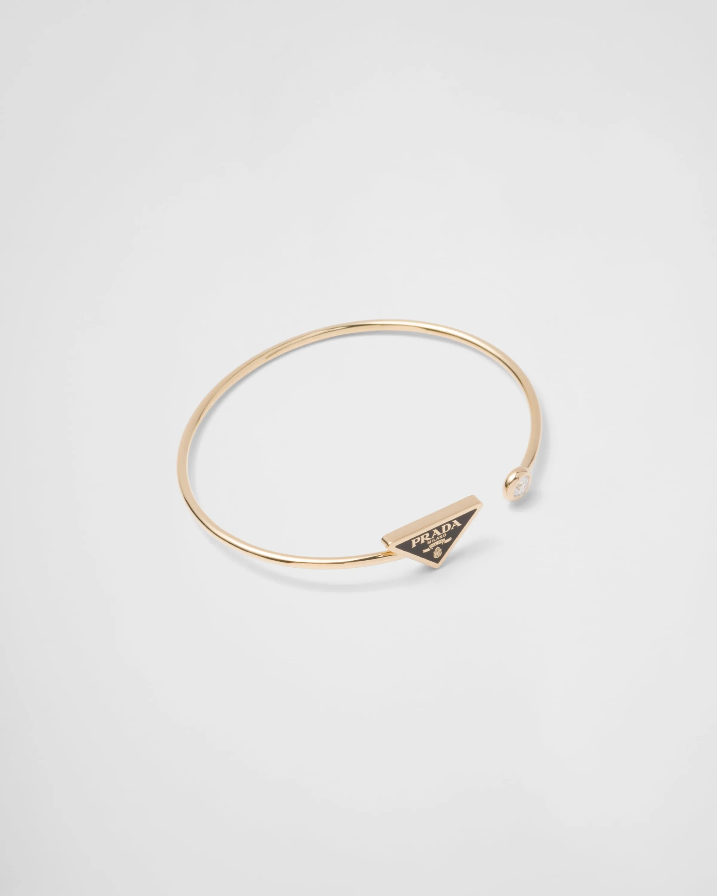 Prada Bracciale rigido Eternal Gold in oro giallo con diamante