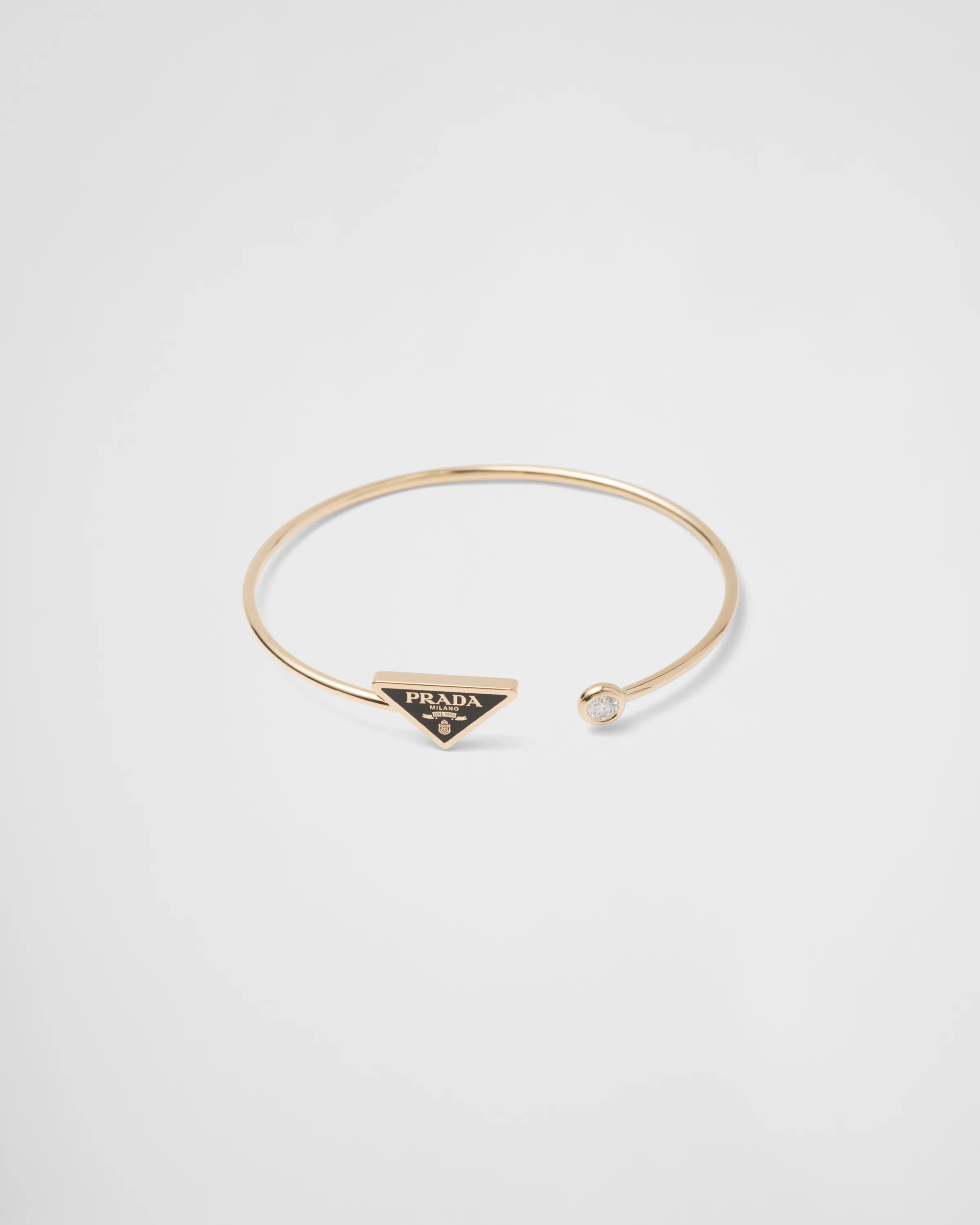 Prada Bracciale rigido Eternal Gold in oro giallo con diamante