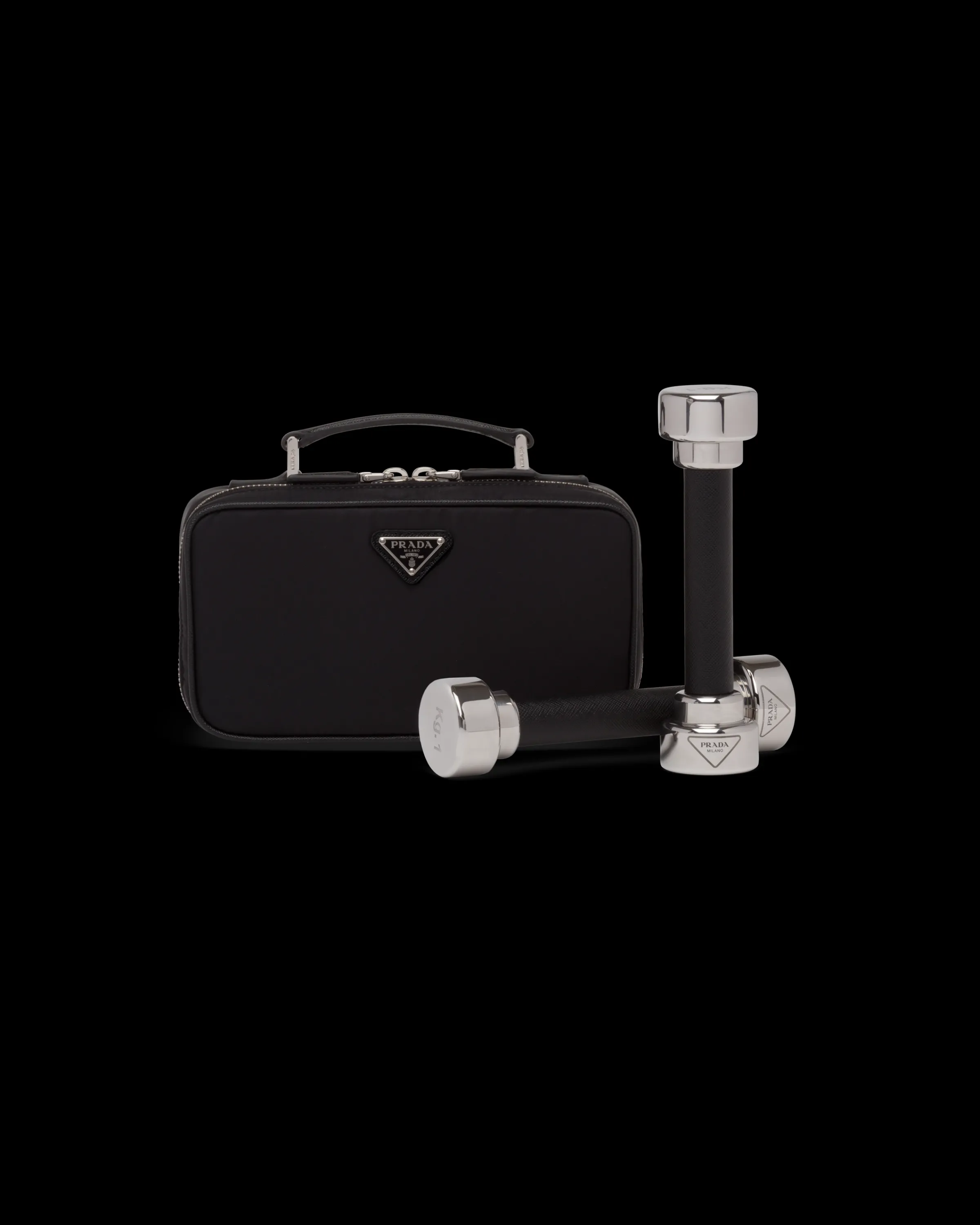 Prada Pesi in acciaio rivestiti in Saffiano con pouch in Re-Nylon