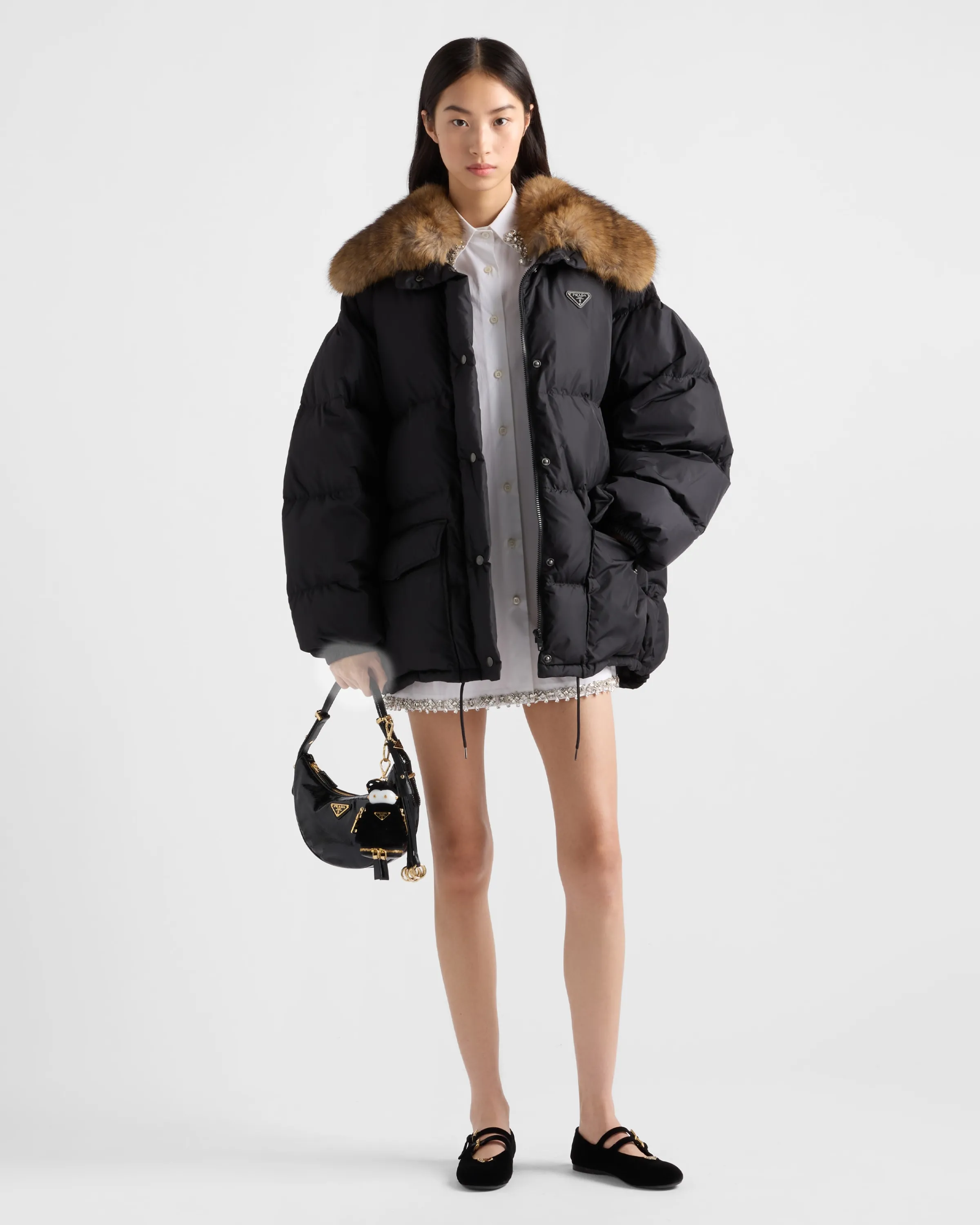 Donna Prada Piumino in tela tecnica